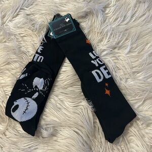 Two pairs of nightmare before Christmas socks